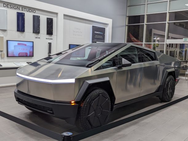 Tesla Cybertruck showcased in a showroom.