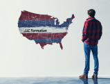 Person looking at US map showing LLC formation considerations across states